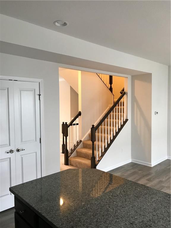 2004 Pointe View Drive Mars, PA 16046 - Photo 18 of 23 a view of staircase with lots of frames on wall and a large window