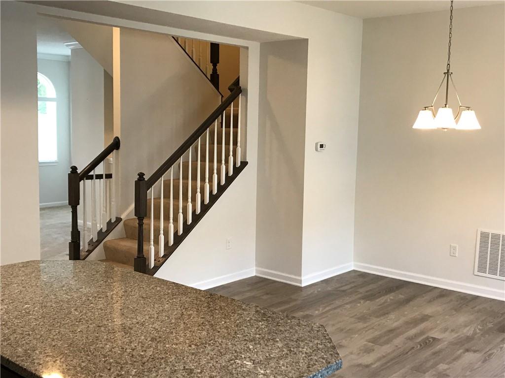 2004 Pointe View Drive Mars, PA 16046 - Photo 2 of 23 a view of a hallway with staircase