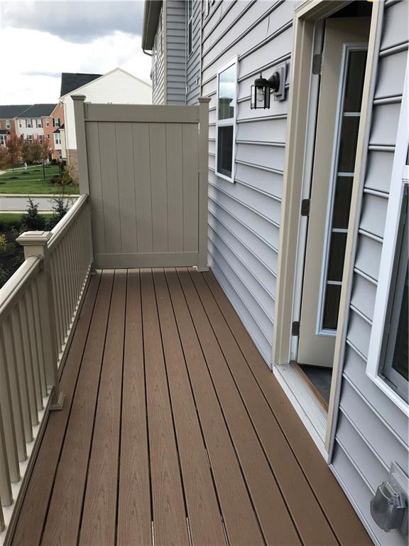 2004 Pointe View Drive Mars, PA 16046 - Photo 7 of 23 a view of a balcony with wooden floor and fence and floor