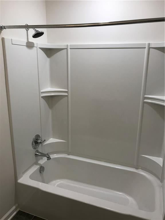 2004 Pointe View Drive Mars, PA 16046 - Photo 9 of 23 a bathroom with a bathtub and a shower