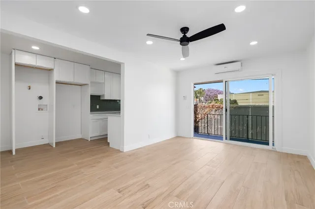 a aerial view of a house with a street
