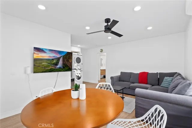 a view of a hallway with furniture