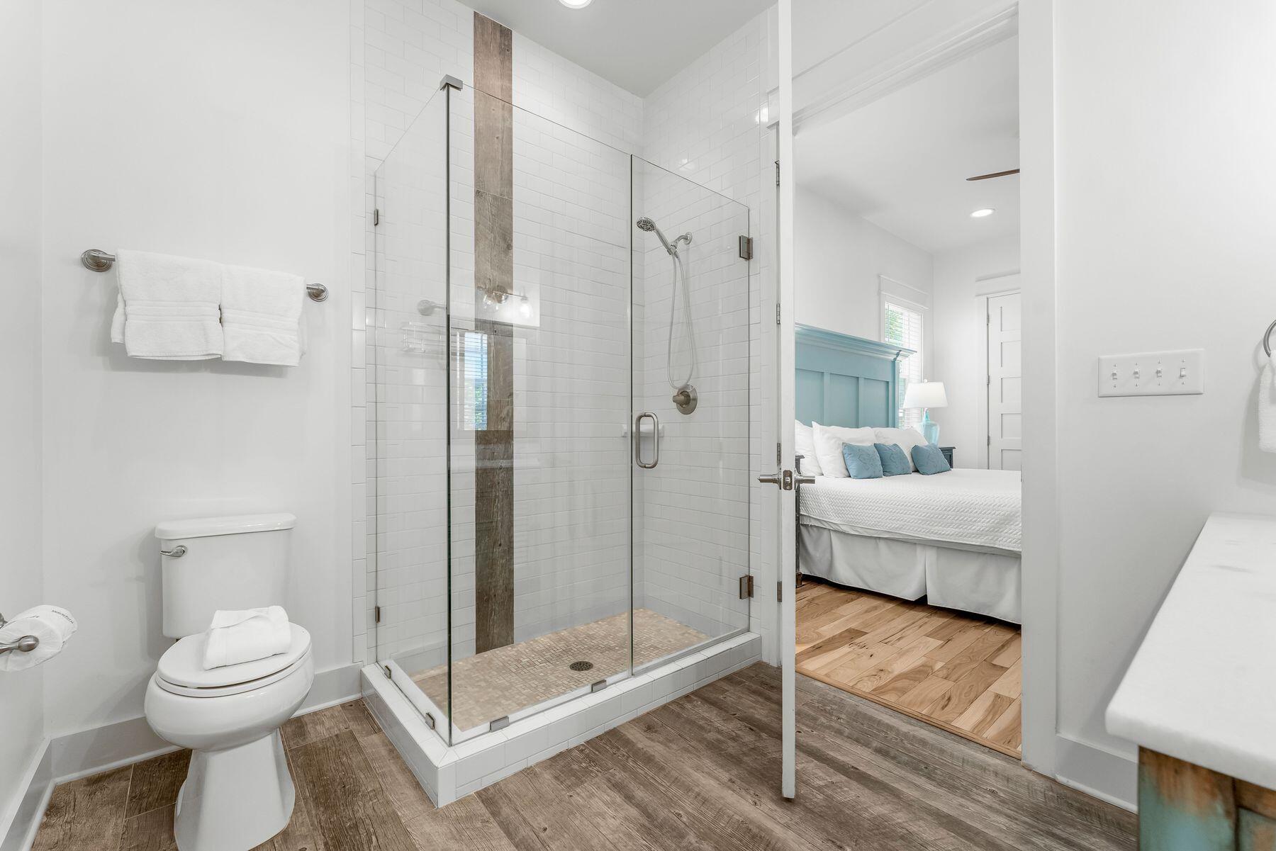 44 The Greenway Loop Inlet Beach, FL 32461 - Photo 16 of 61 a bathroom with a toilet and a shower