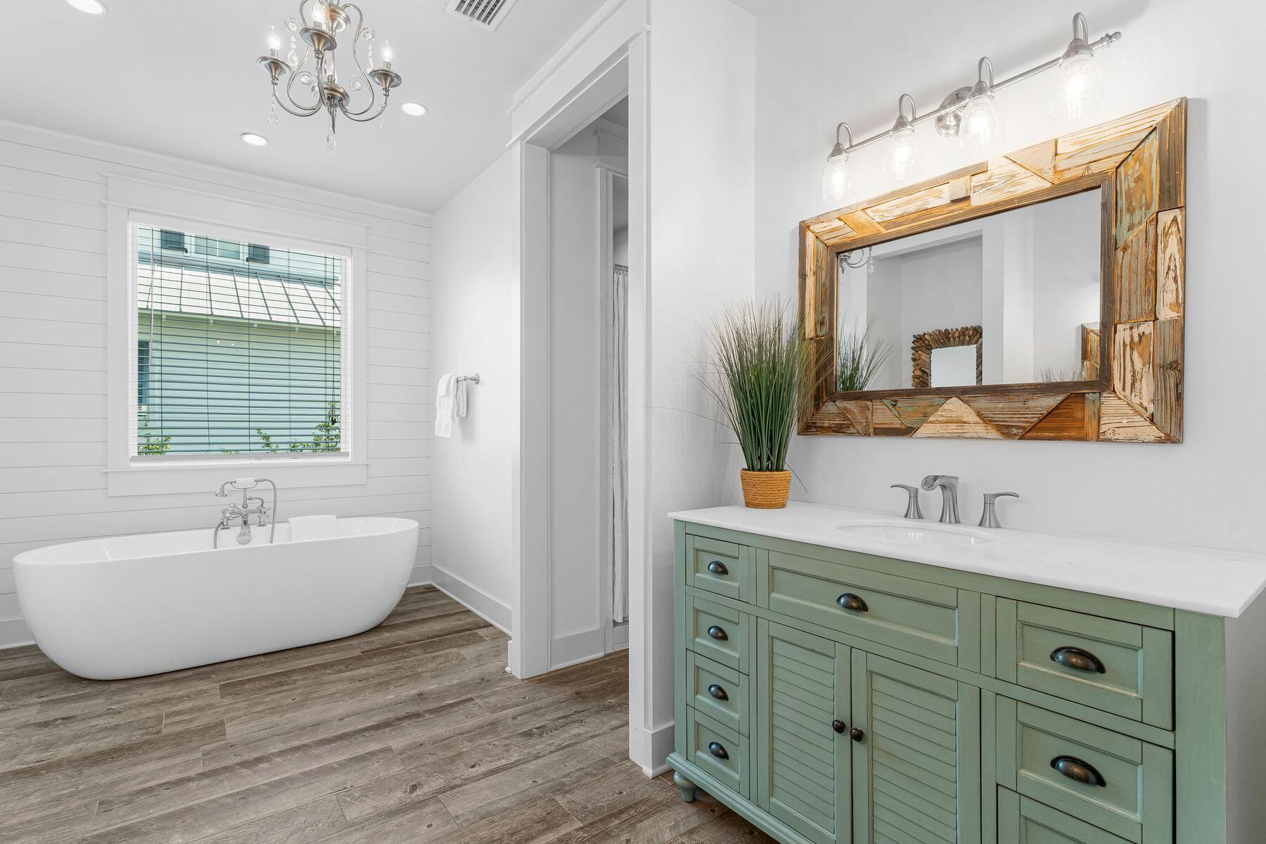 44 The Greenway Loop Inlet Beach, FL 32461 - Photo 29 of 61 a bathroom with a double vanity sink mirror and bathtub