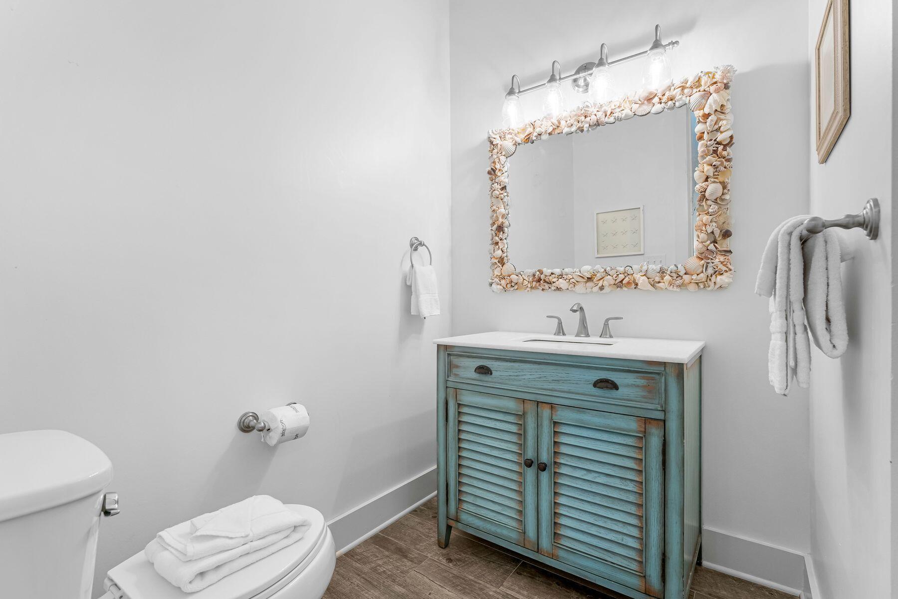 44 The Greenway Loop Inlet Beach, FL 32461 - Photo 33 of 61 a bathroom with a sink vanity and a mirror