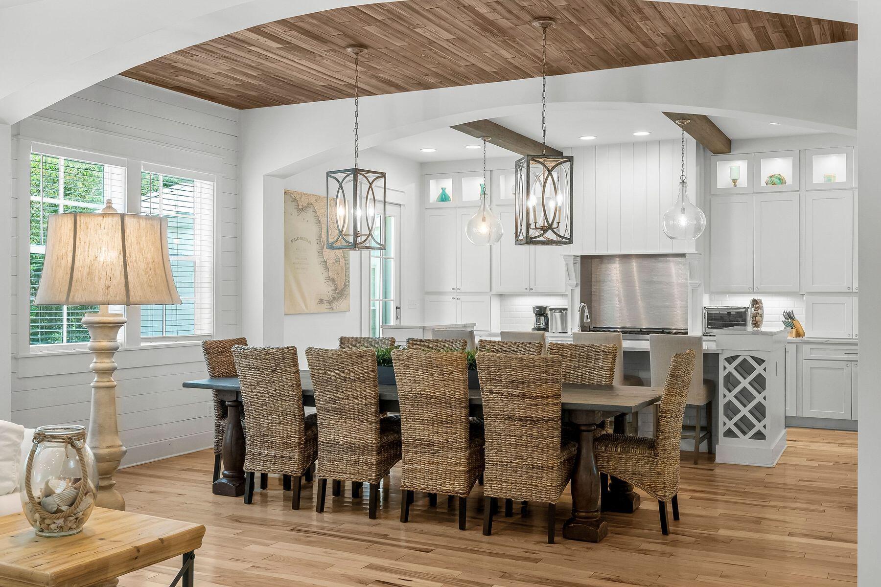 44 The Greenway Loop Inlet Beach, FL 32461 - Photo 10 of 61 a view of a dining room with furniture and wooden floor