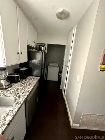 a bed room with a bed and a tub