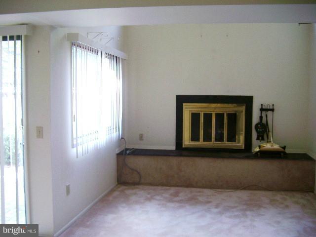 11236 B Powder Run, Unit B Columbia, MD 21044 - Photo 6 of 7 a living room with a large window
