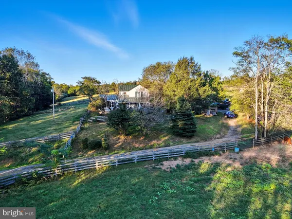 a view of a yard from a balcony