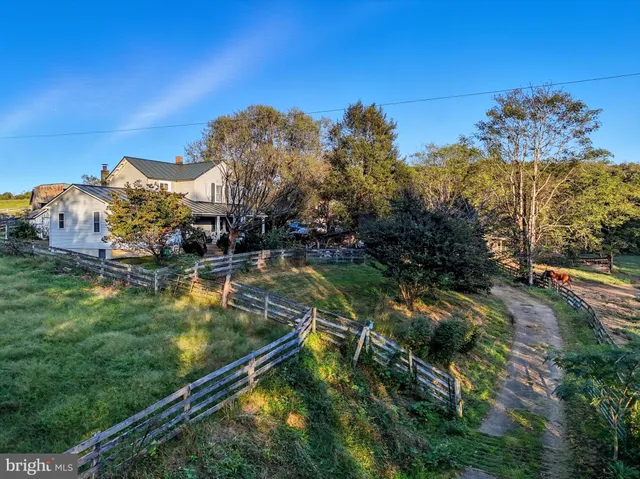 a view of a lake with a yard