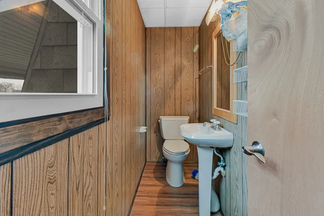 a bathroom with a sink and toilet