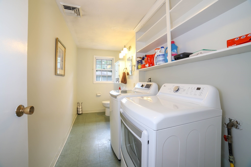 40 Old Stage Road Chelmsford, MA 01824 - Photo 20 of 34 a utility room with dryer and washer