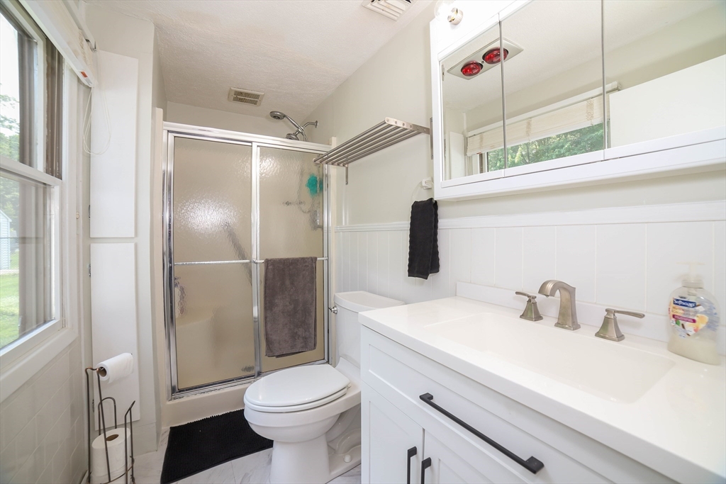 40 Old Stage Road Chelmsford, MA 01824 - Photo 21 of 34 a bathroom with a sink toilet and shower