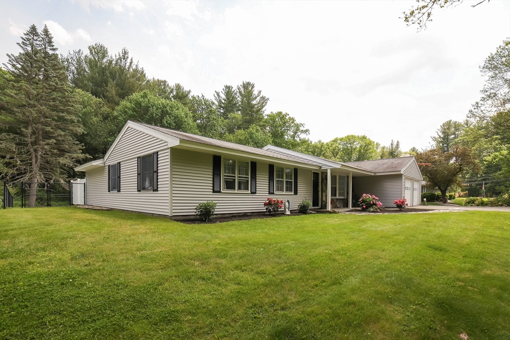 40 Old Stage Road Chelmsford, MA 01824 - Photo 24 of 34 a view of a house with a yard