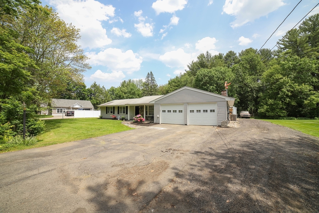 40 Old Stage Road Chelmsford, MA 01824 - Photo 27 of 34 a front view of house with yard and green space