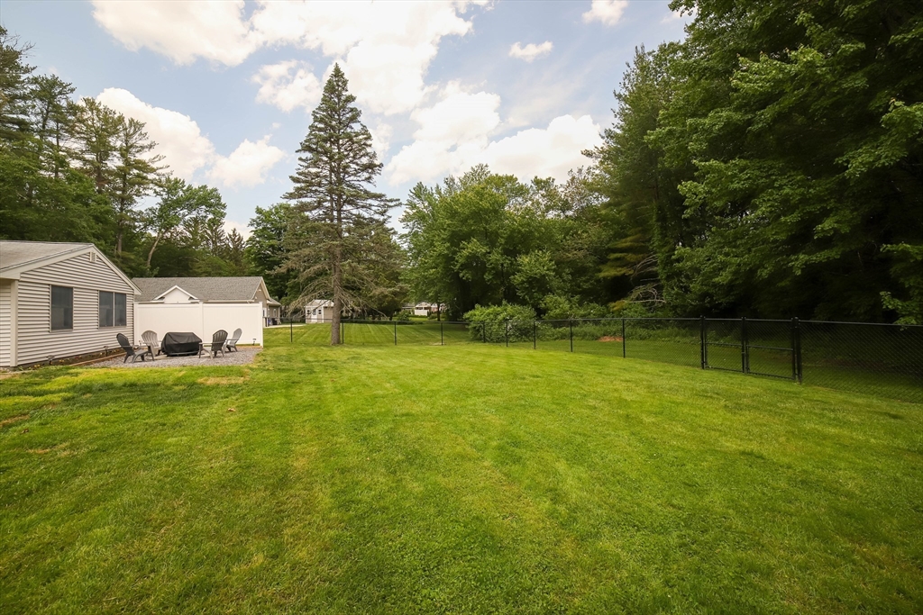 40 Old Stage Road Chelmsford, MA 01824 - Photo 33 of 34 a front view of a house with garden