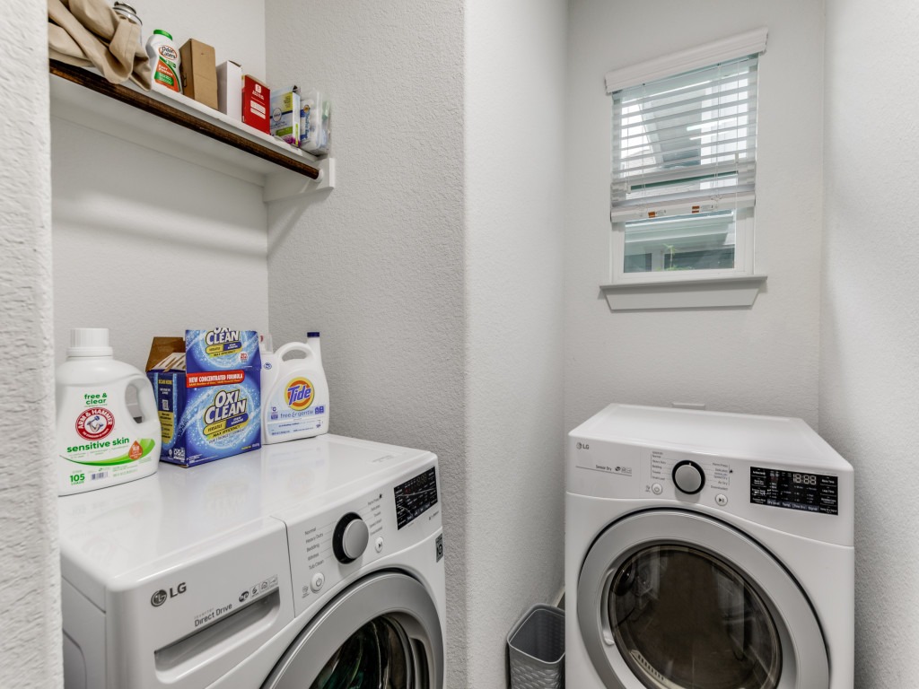 2204 Montague Street Austin, TX 78741 - Photo 22 of 25 a utility room with dryer and washer