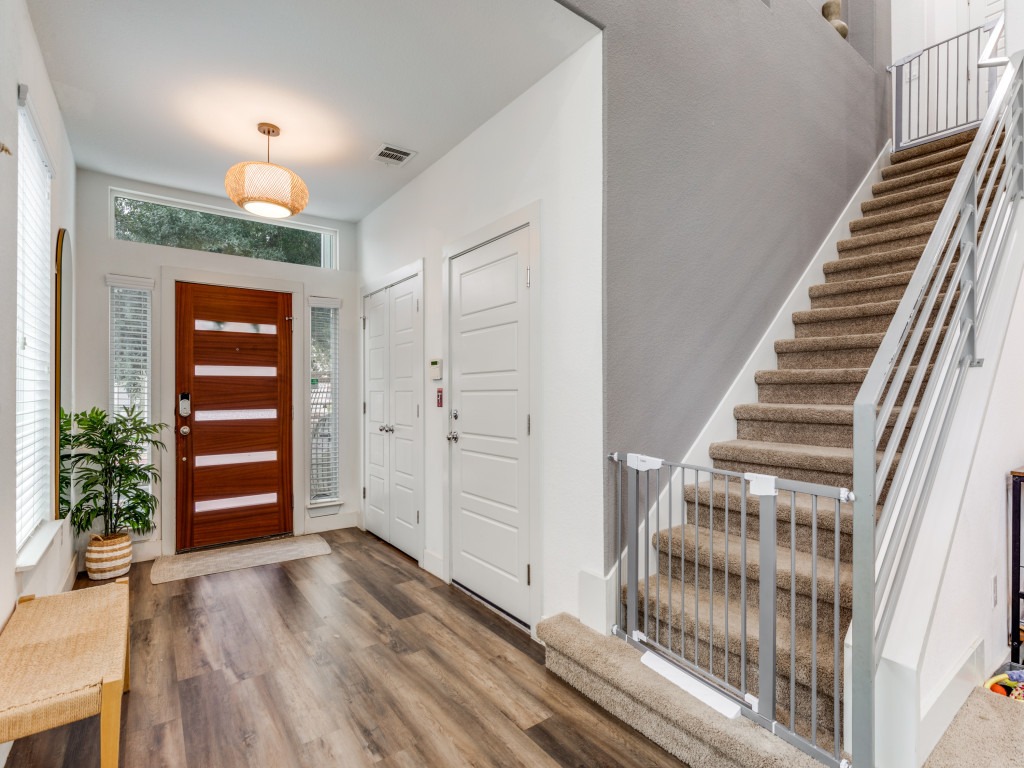 2204 Montague Street Austin, TX 78741 - Photo 7 of 25 wooden floor in an empty room with a window