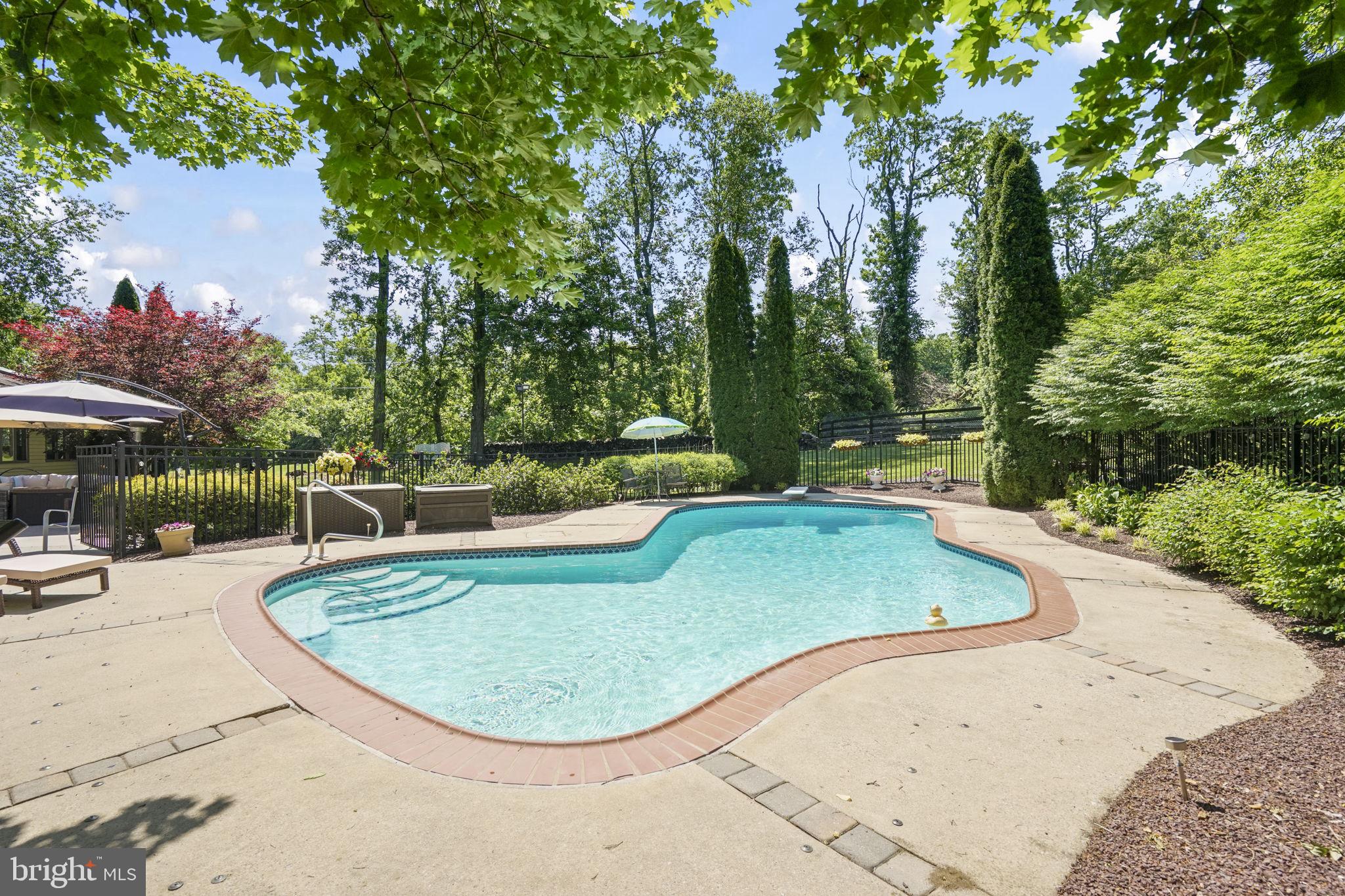 26 Ellisdale Road Allentown, NJ 08501 - Photo 43 of 45 Serene poolside retreat in nature.
