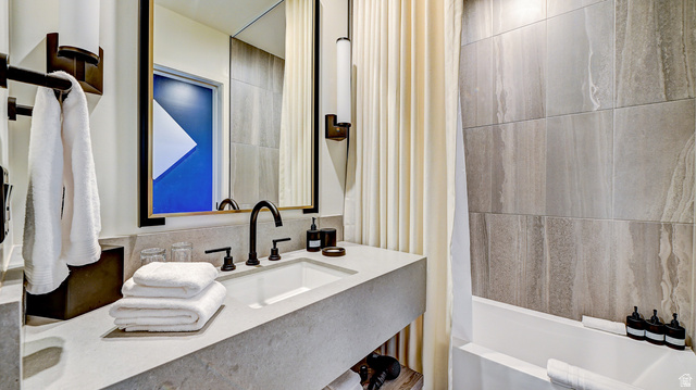 2417 West High Road, Unit 2515 Park City, UT 84098 - Photo 29 of 67 Bathroom with shower / bath combo with shower curtain and vanity