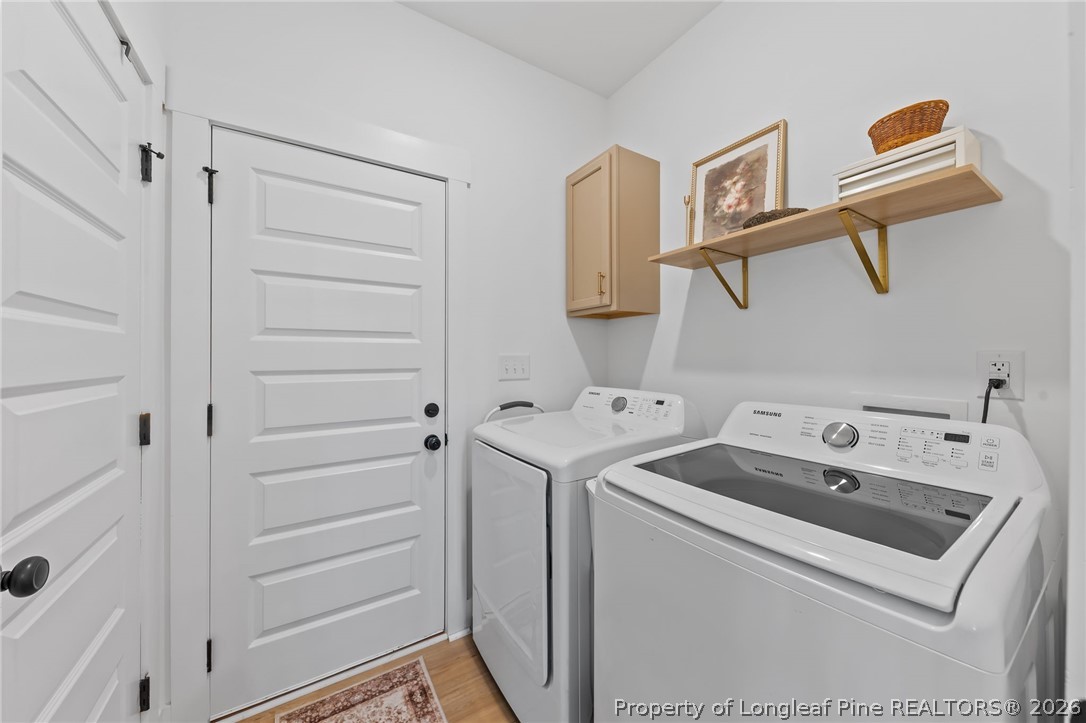 278 Slade Corner Road Raeford, NC 28376 - Photo 15 of 39 a utility room with dryer and washer