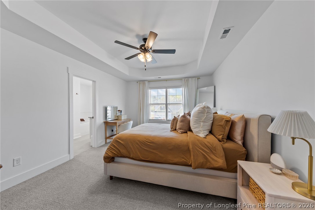 278 Slade Corner Road Raeford, NC 28376 - Photo 18 of 39 a bedroom with a bed and window