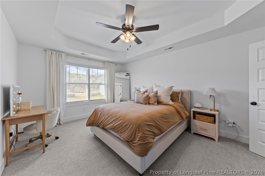 278 Slade Corner Road Raeford, NC 28376 - Photo 19 of 39 a bedroom with a bed and a desk