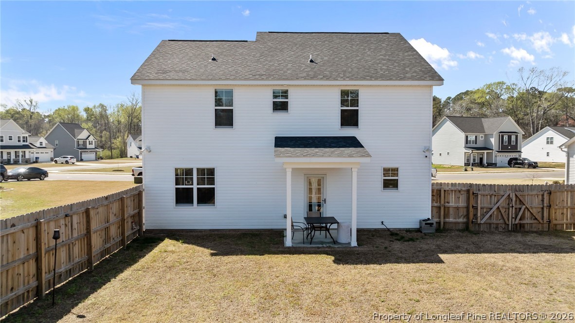 278 Slade Corner Road Raeford, NC 28376 - Photo 34 of 39 a front view of a house with a yard