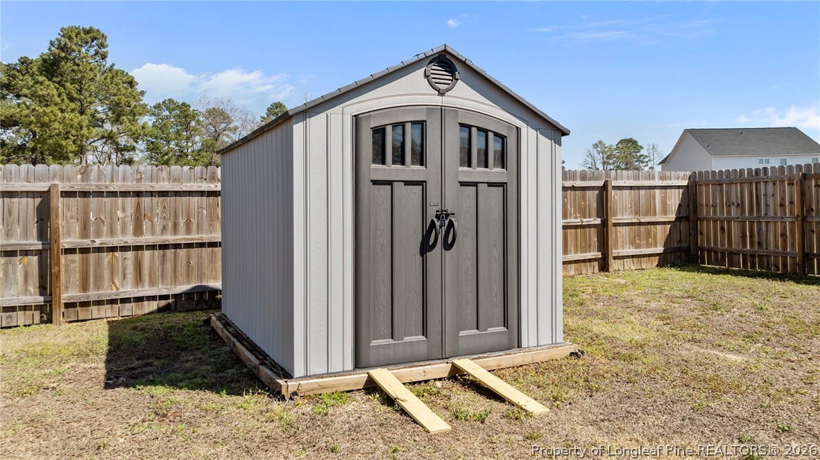 278 Slade Corner Road Raeford, NC 28376 - Photo 37 of 39 a front view of a house with a yard