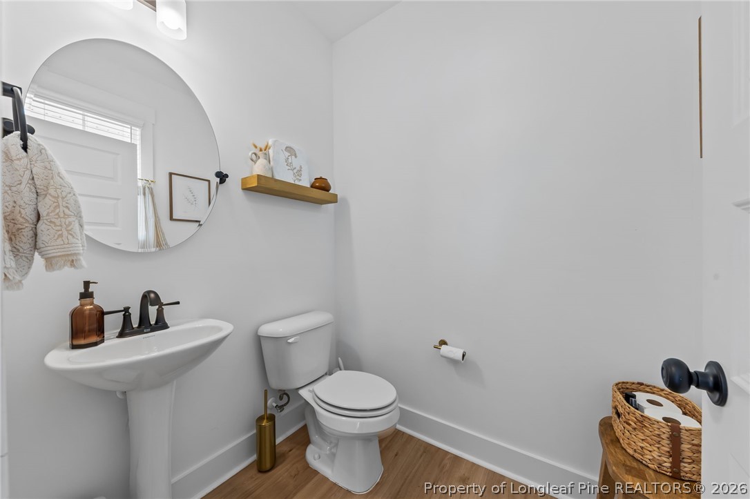 278 Slade Corner Road Raeford, NC 28376 - Photo 4 of 39 a bathroom with a sink and a toilet