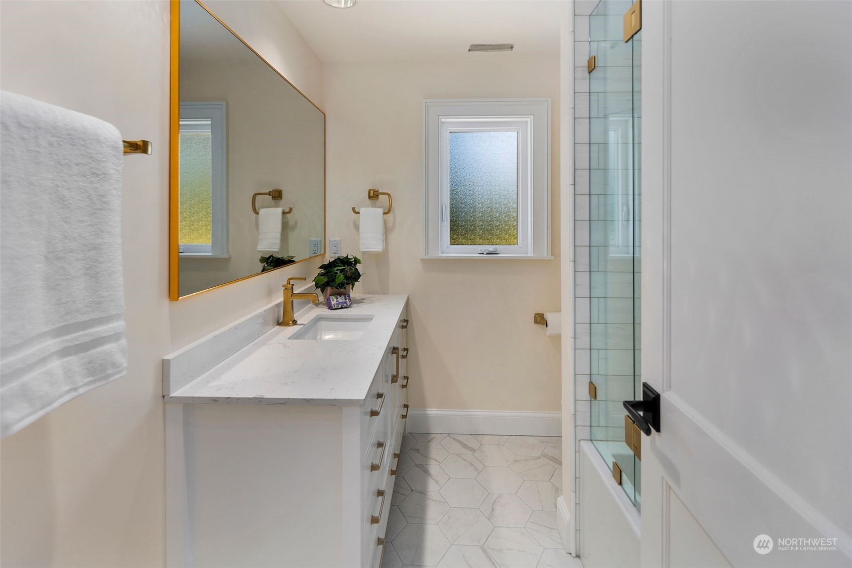 24124 7th Avenue Southeast Bothell, WA 98021 - Photo 24 of 40 a bathroom with a sink and a mirror