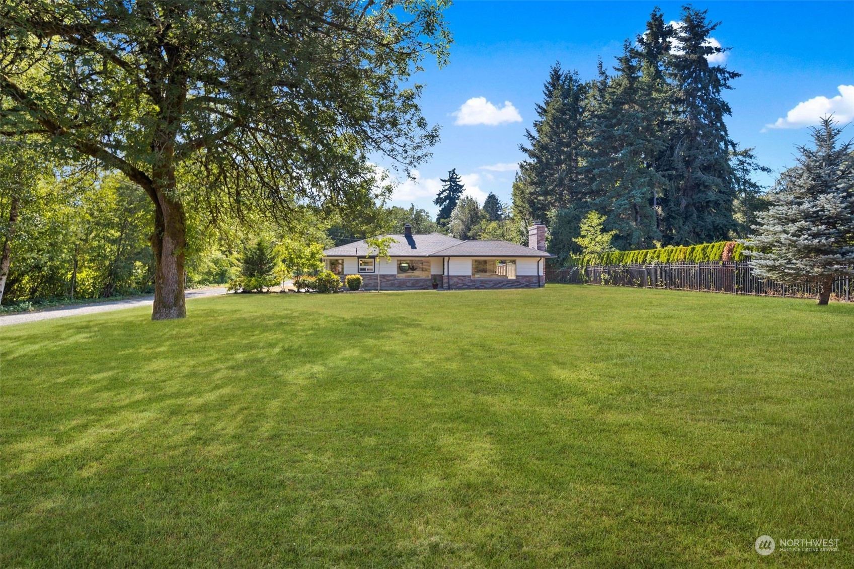 24124 7th Avenue Southeast Bothell, WA 98021 - Photo 37 of 40 a view of a house with a big yard