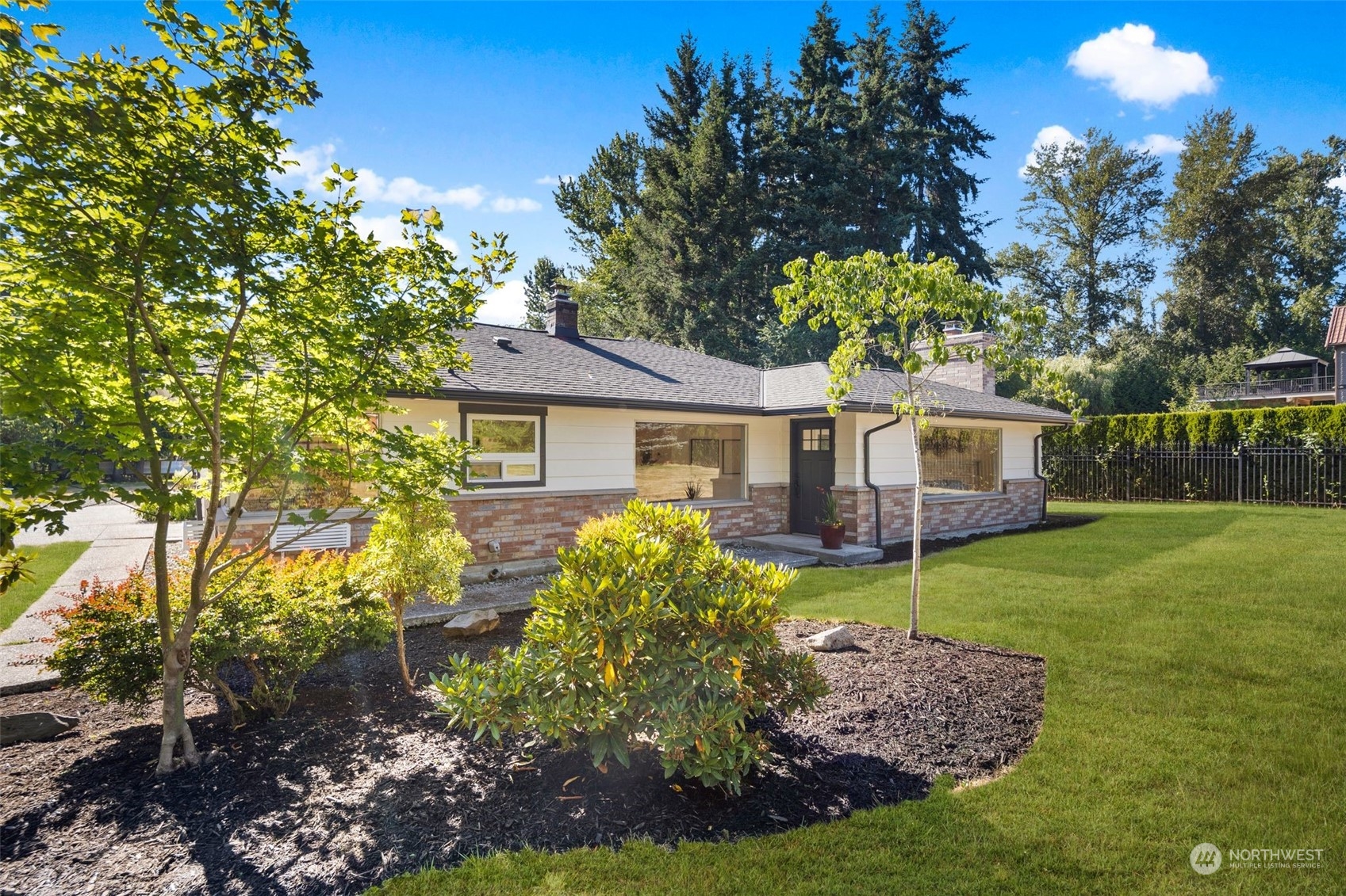 24124 7th Avenue Southeast Bothell, WA 98021 - Photo 5 of 40 a front view of house with yard and green space