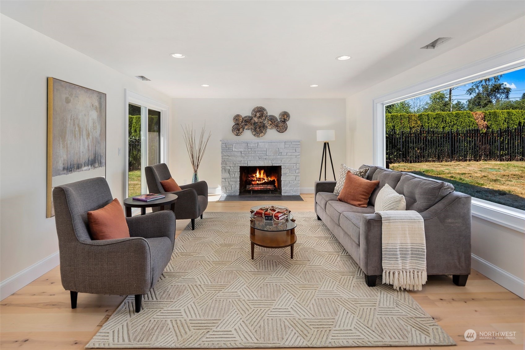 24124 7th Avenue Southeast Bothell, WA 98021 - Photo 8 of 40 a living room with furniture and a fireplace