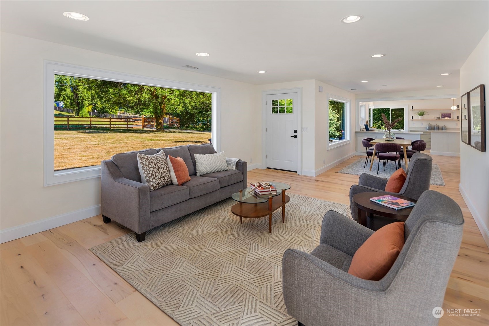 24124 7th Avenue Southeast Bothell, WA 98021 - Photo 9 of 40 a living room with furniture and a large window