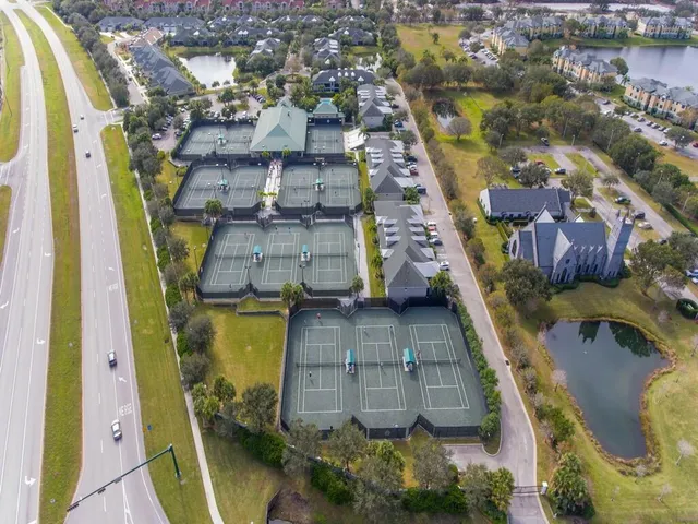 a view of residential houses with outdoor space