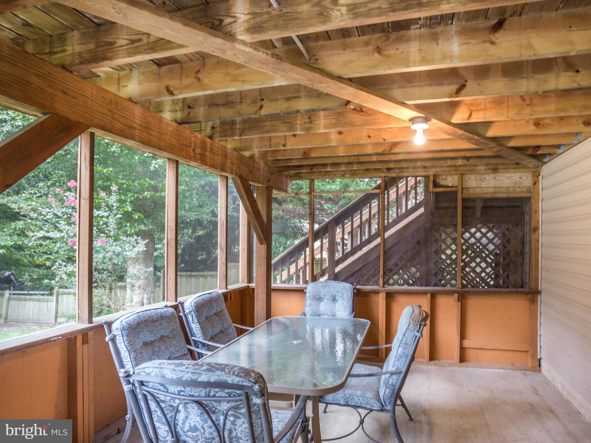 11408 Redlands Road Lusby, MD 20657 - Photo 22 of 27 Lower level screened in patio with electric
