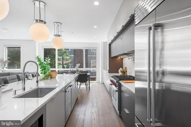 a bedroom with a large bed and a couch