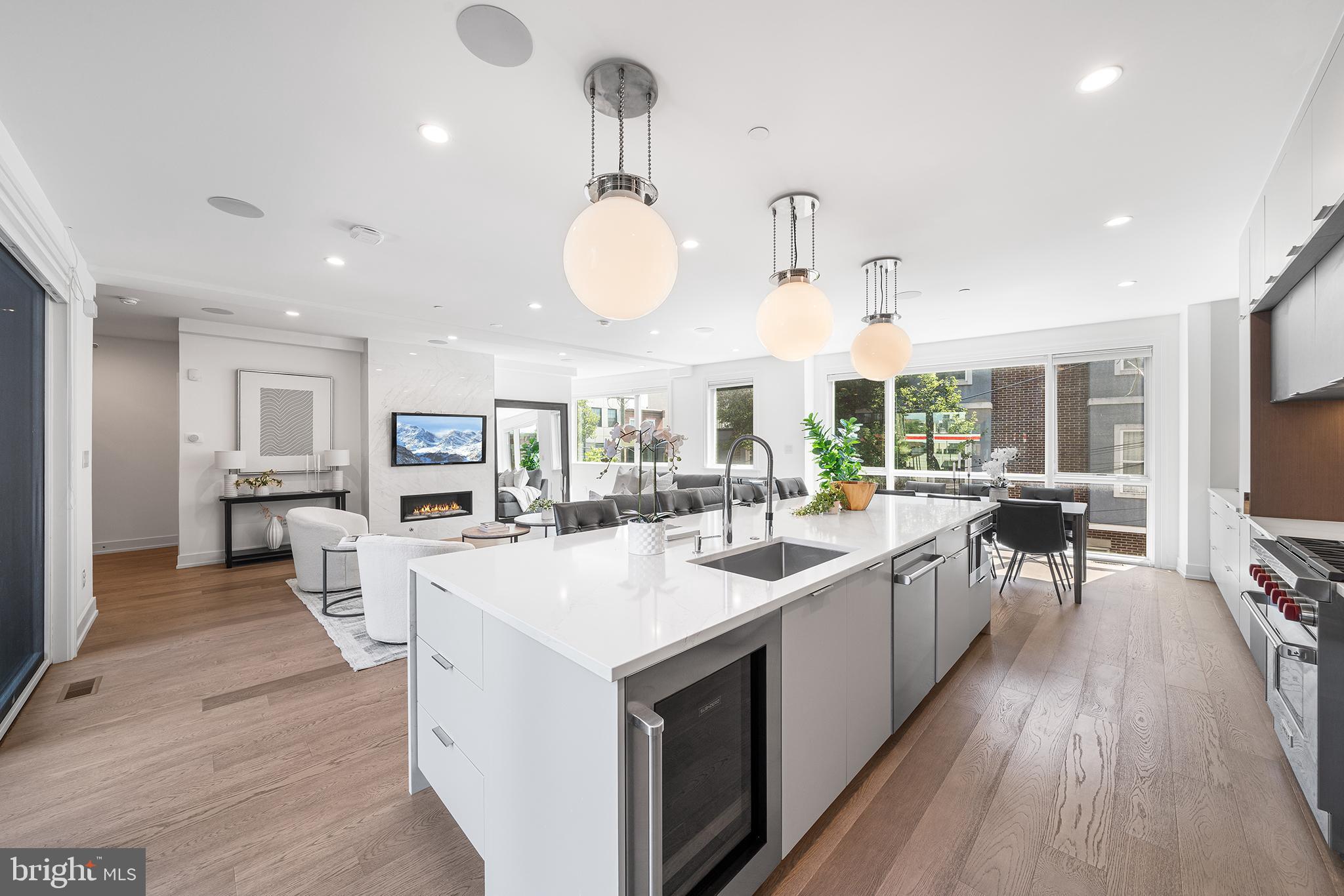 618 South Clarion Street Philadelphia, PA 19147 - Photo 17 of 65 a large kitchen with kitchen island a large island in it