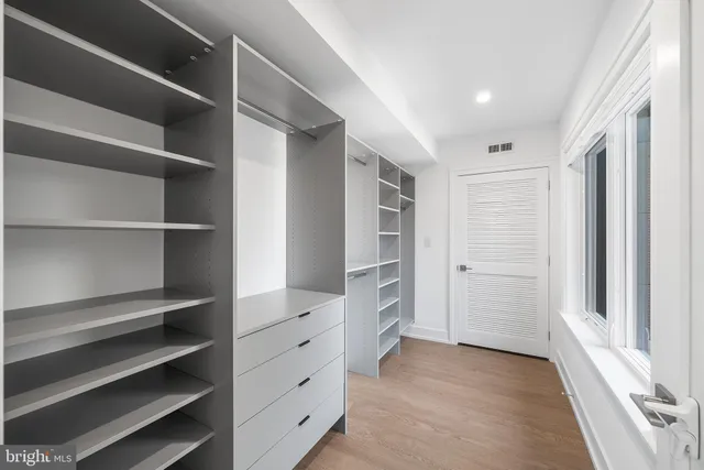 a bathroom with a shower and a toilet