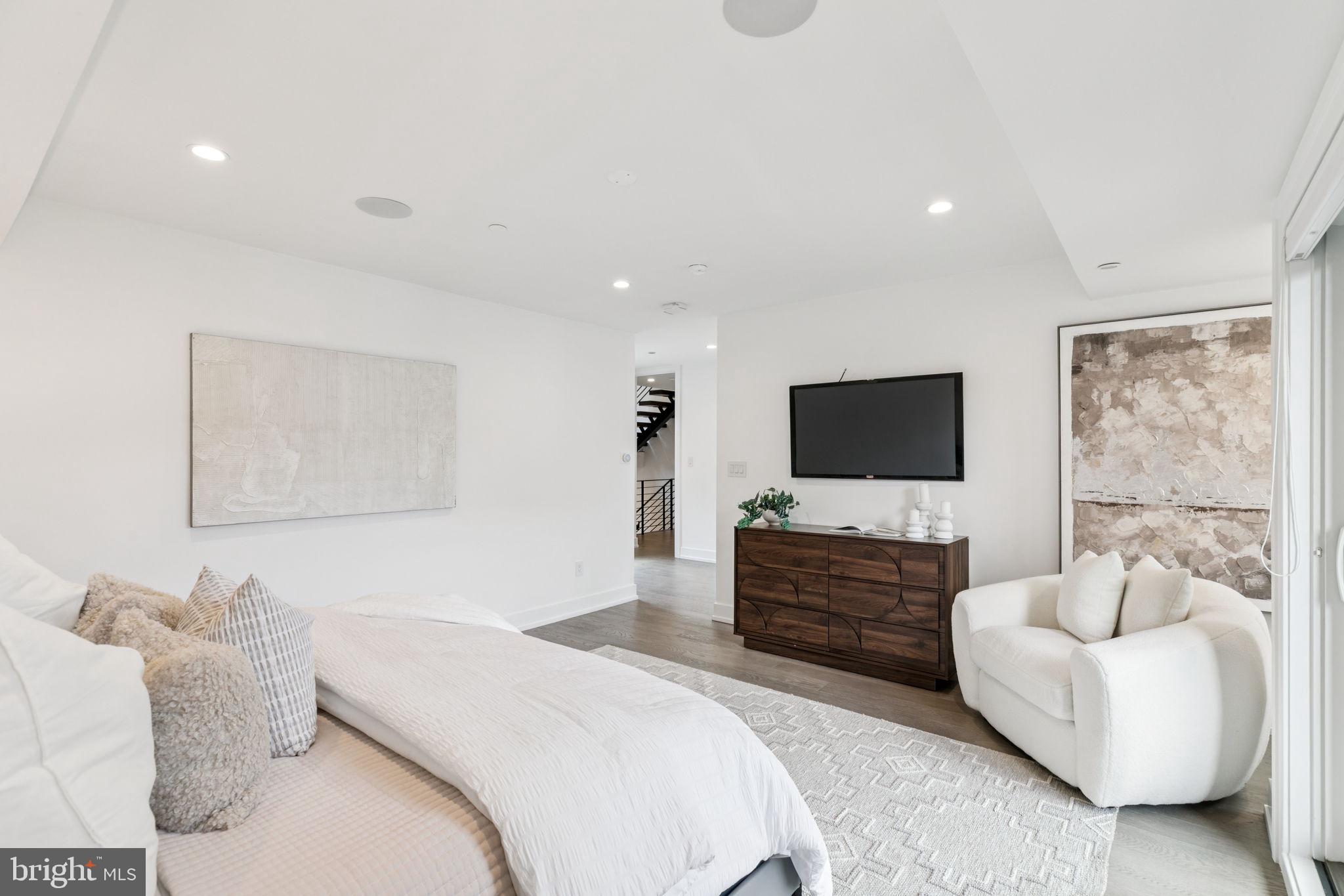 618 South Clarion Street Philadelphia, PA 19147 - Photo 27 of 65 a bedroom with a bed a couch and dresser