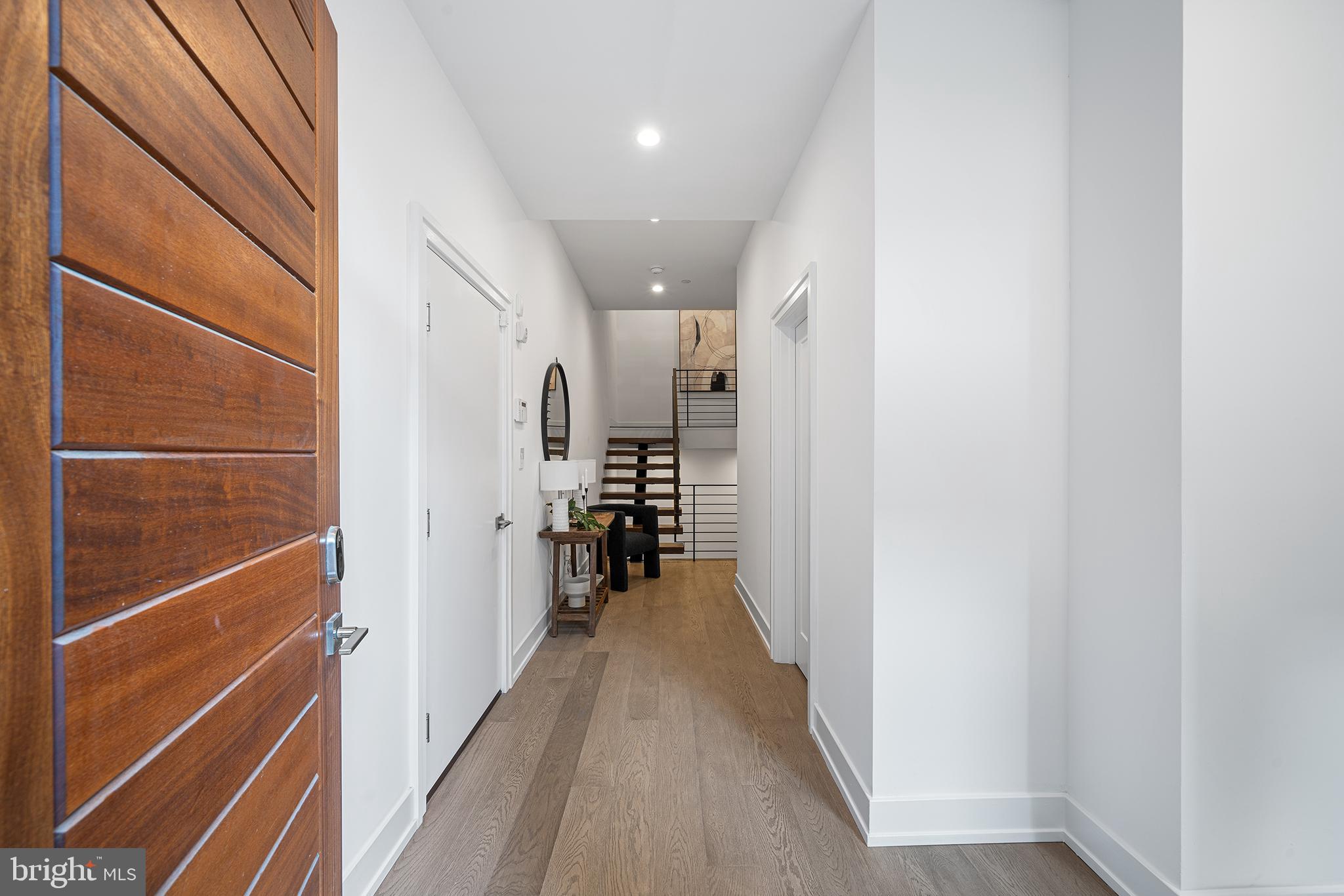618 South Clarion Street Philadelphia, PA 19147 - Photo 3 of 65 a view of hallway with wooden floor