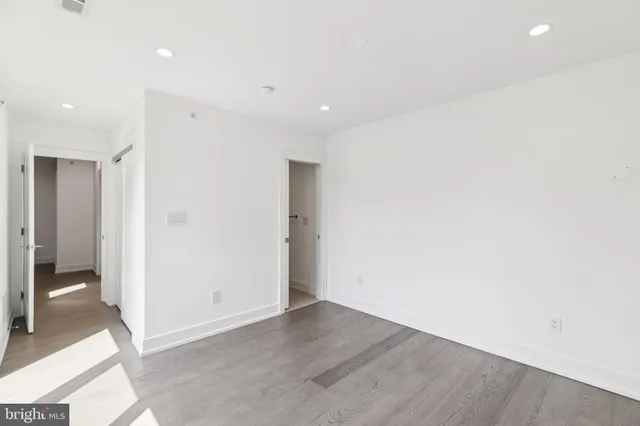 a view of entryway with wooden floor