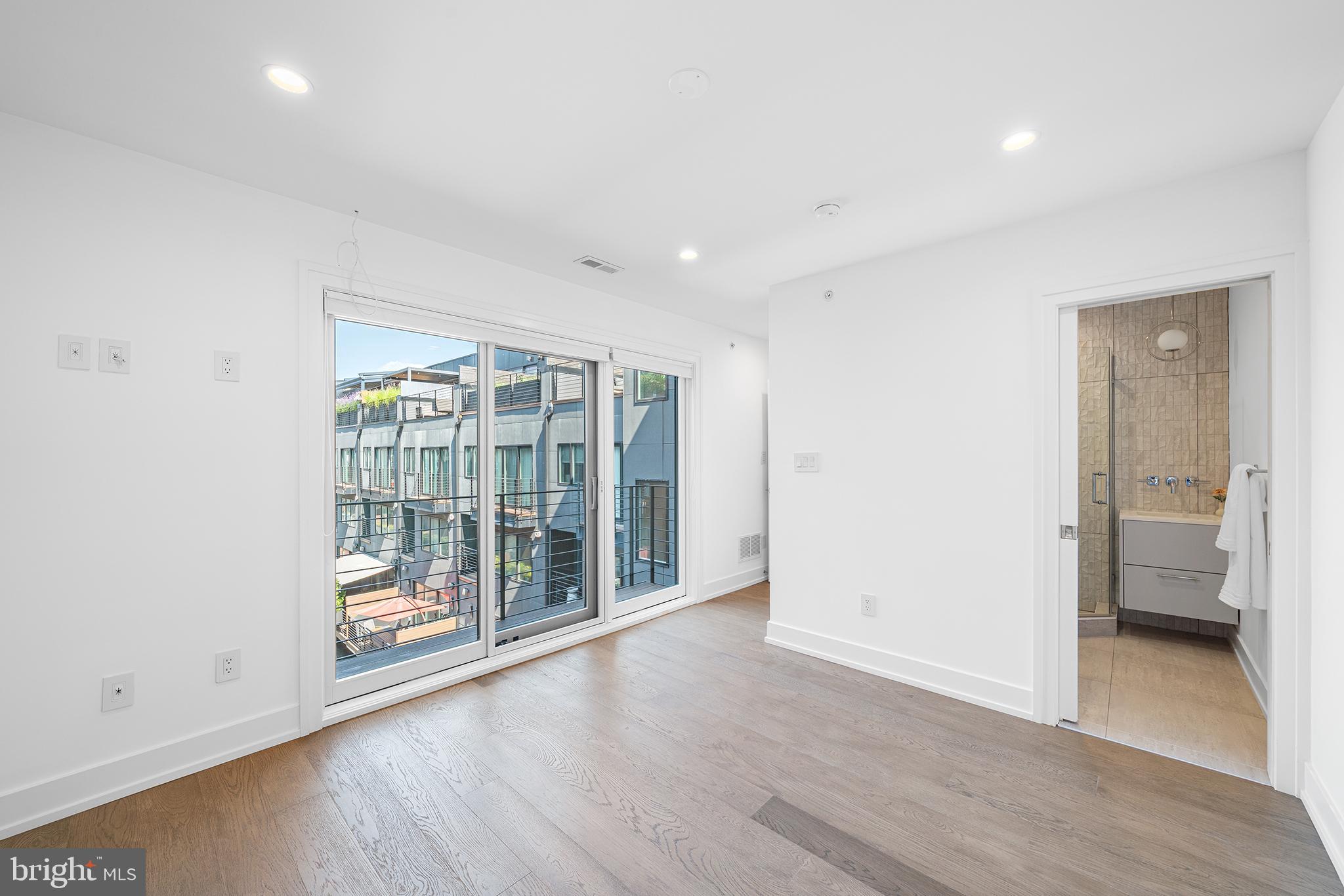 618 South Clarion Street Philadelphia, PA 19147 - Photo 35 of 65 wooden floor in an empty room with a window