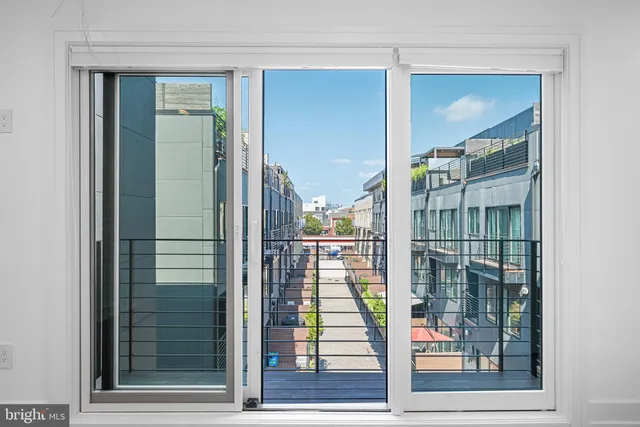 a view of swimming pool from a balcony