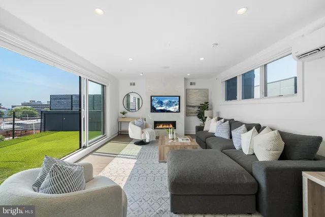 a view of livingroom with furniture and closet