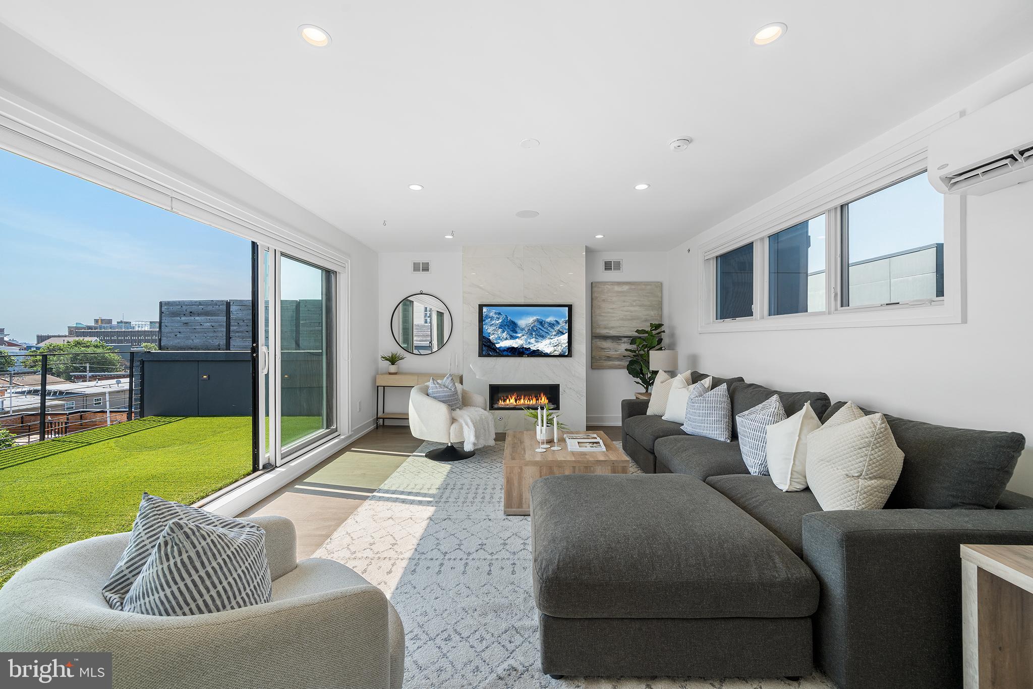 618 South Clarion Street Philadelphia, PA 19147 - Photo 45 of 65 a living room with furniture and a table