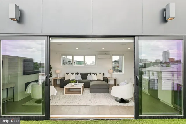 a front view of a multi story residential apartment buildings