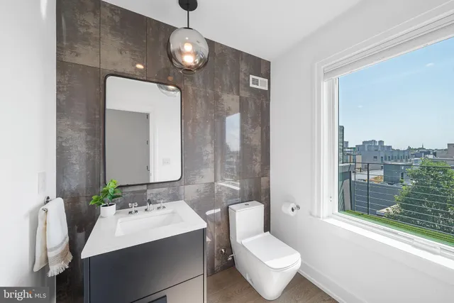 a front view of a multi story residential apartment building