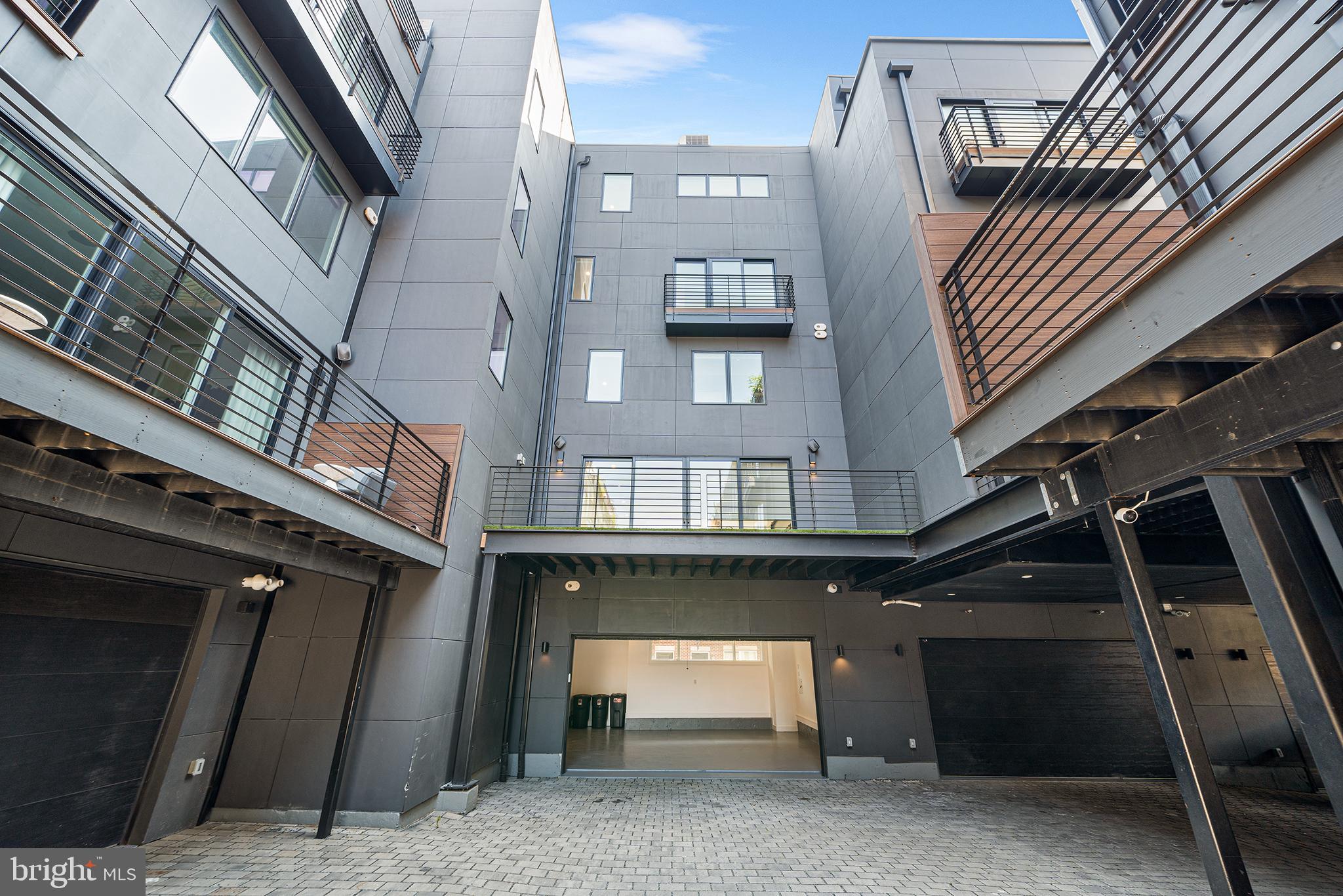 618 South Clarion Street Philadelphia, PA 19147 - Photo 59 of 65 a front view of a building with a garage